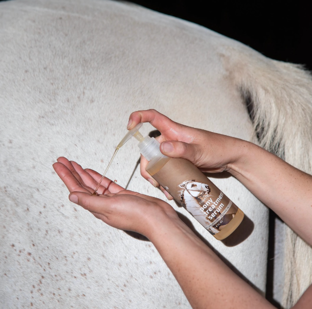 white horse with ultimate treatment serum