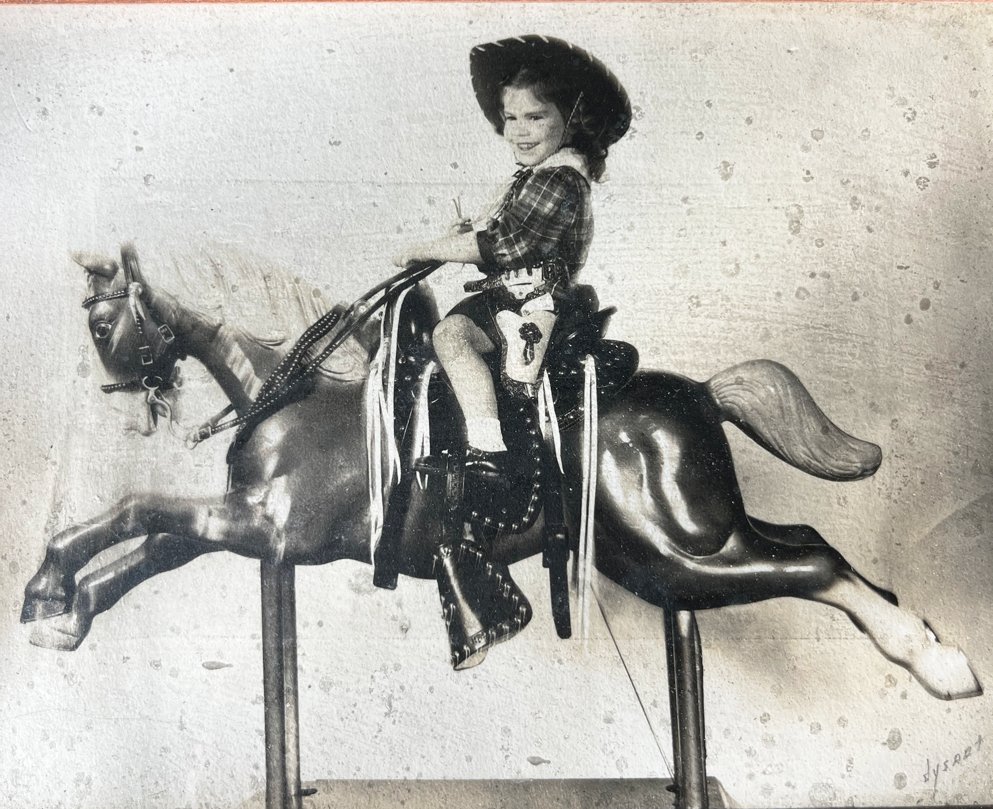 kate riding the mechanical horse aka electric pony